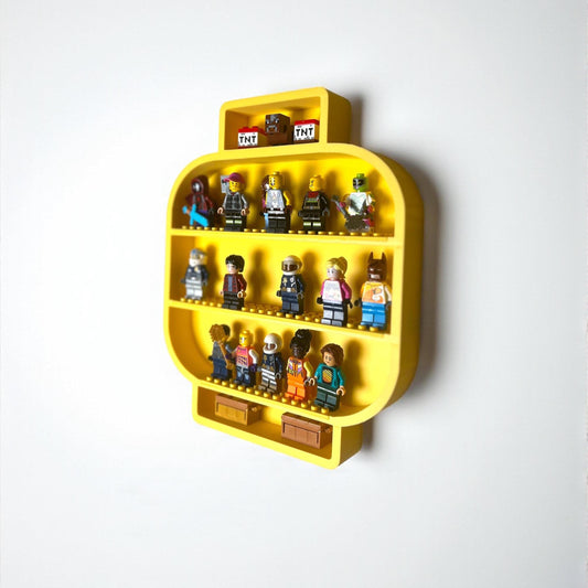 Yellow LEGO minifigure head shelf mounted on a wall in a child’s room, used as storage for minifigures and small collectibles.